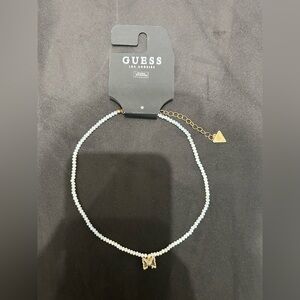 Guess Gold and White Butterfly Necklace